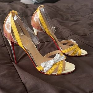 Christian Louboutin tape measure heels!